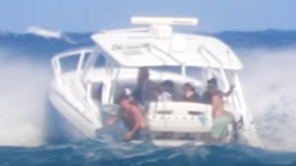 Group of teenagers seen on a boat dumping trash in the ocean off Florida