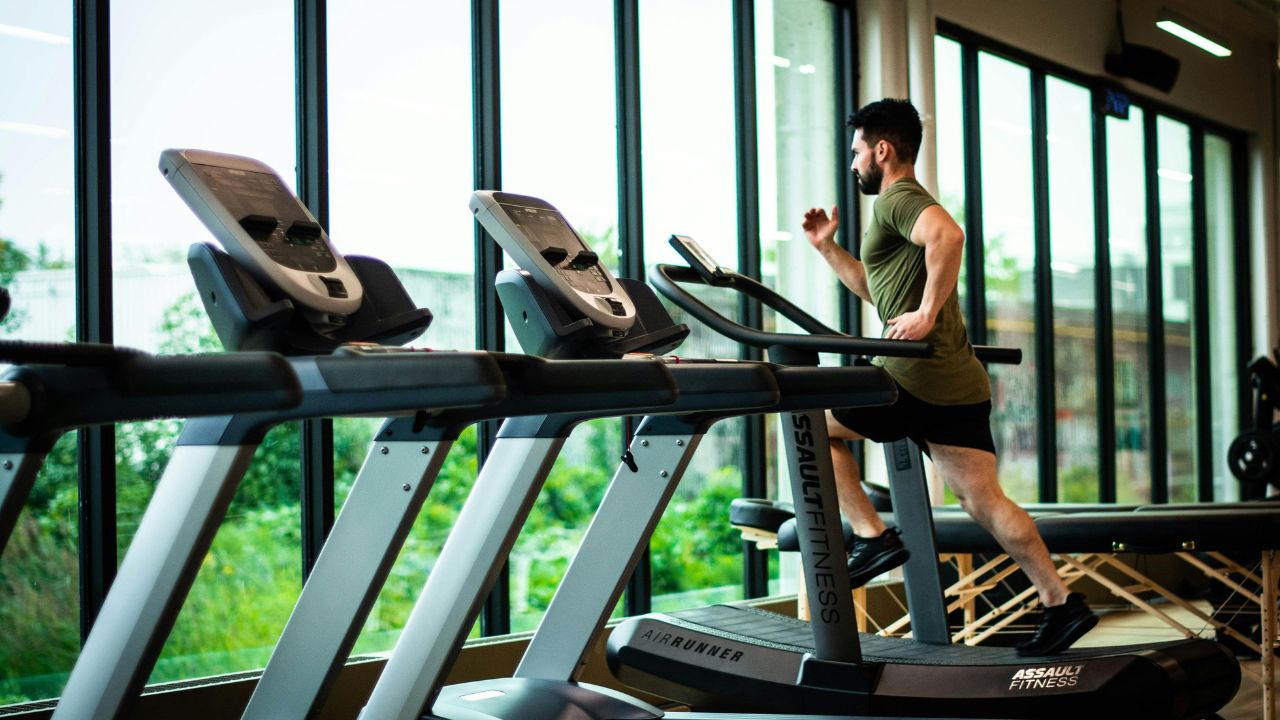 Man works out at a gym