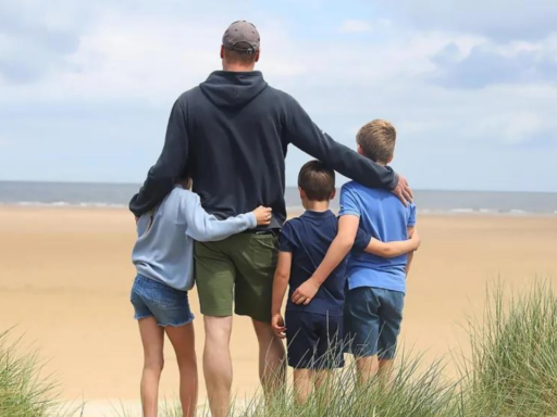 Prince William poses with his children on Father's Day at a beach in Norfolk