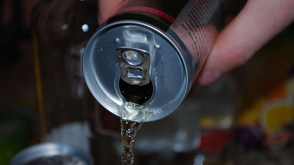 Energy Drink being poured into a glass